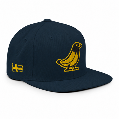 Banana Crow Allegiance embroidered snapback cap in Dark Navy right view with side flag patch