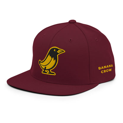 Banana Crow Allegiance embroidered snapback cap in Maroon left view with BANANA CROW side text