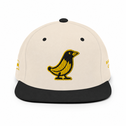 Banana Crow Allegiance embroidered snapback cap in Natural / Black front view